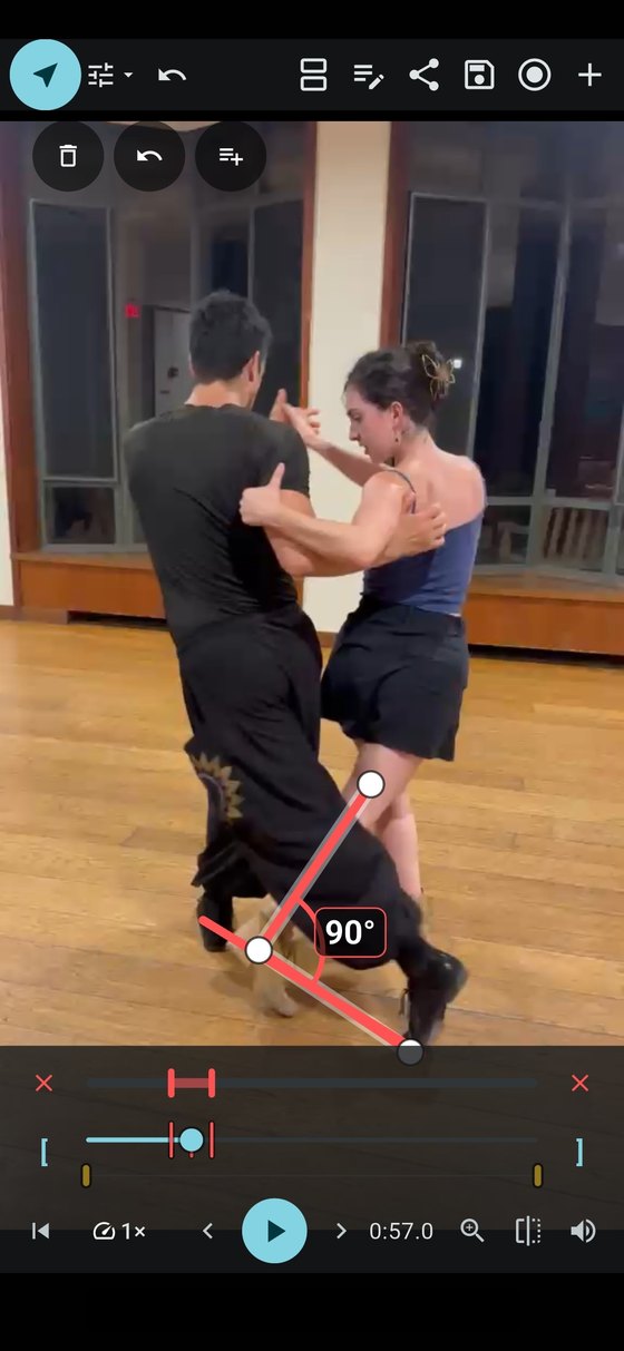 InForm measuring a 90° angle on a tango back sacada, paused mid-step